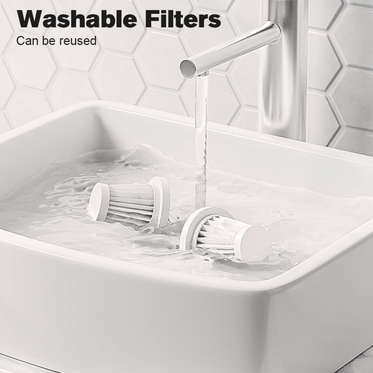 Washable wet/dry vacuum filter inside a tub with running water and splash guard