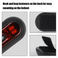Motorbike helmet tail light with hook-and-loop fasteners on black back pad.