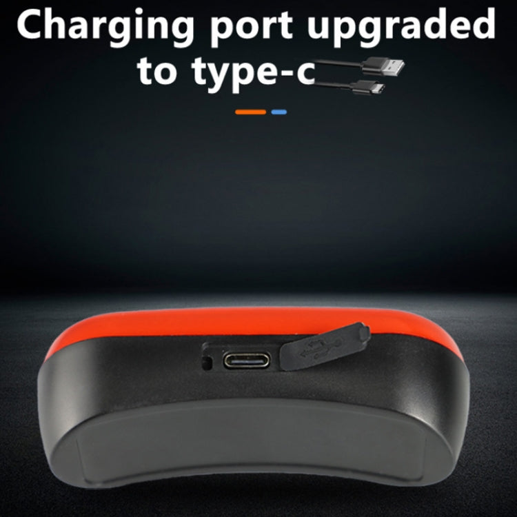 Orange rechargeable tail light underside with Type-C charging port