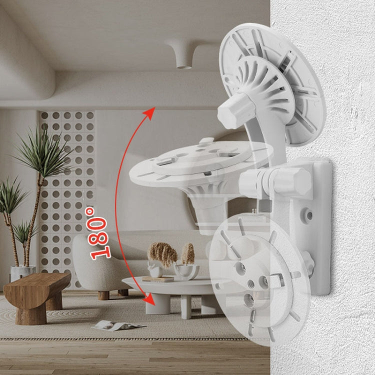 White plastic punch-free camera mount bracket with 180° swing arm on wall
