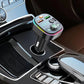 Car Bluetooth FM transmitter plugged into car dash with LED display and colored ring