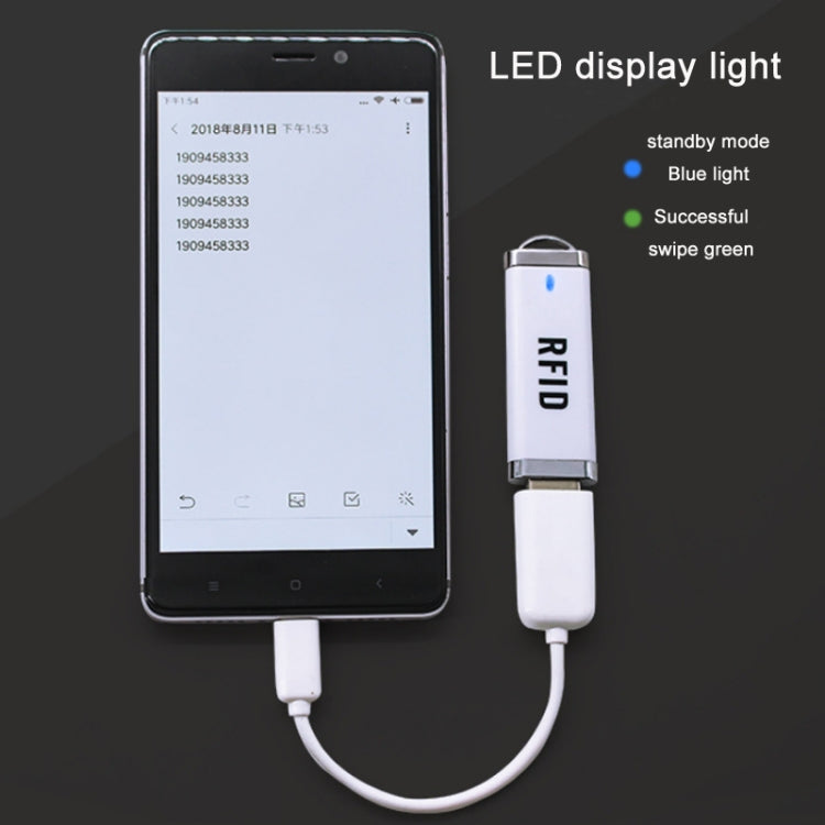 RFID USB reader with LED indicator light connected to a smartphone via cable