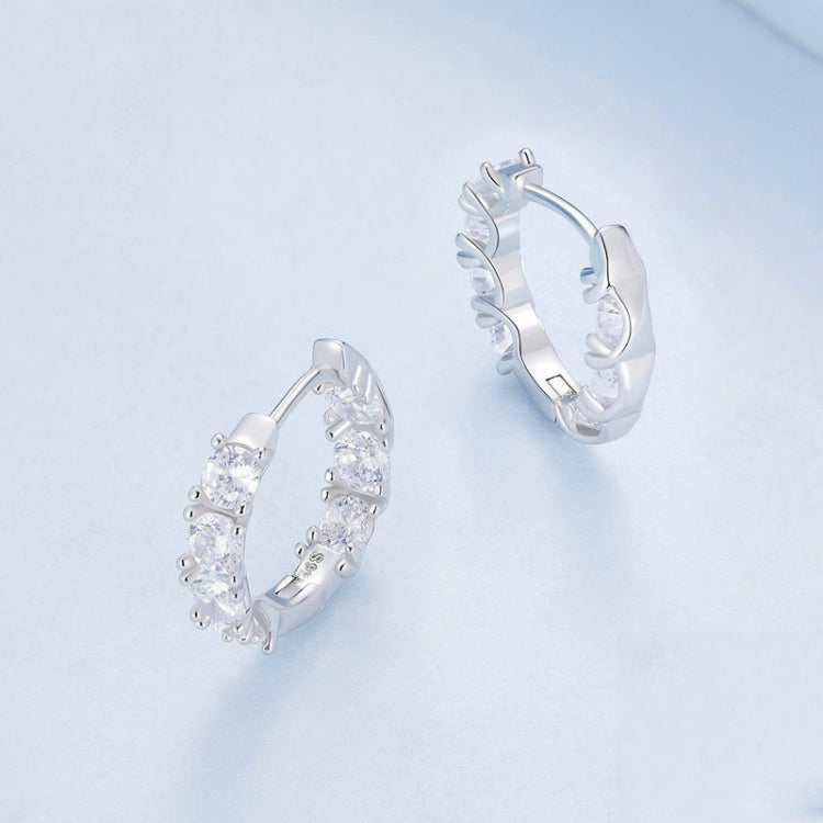 Silver zirconia hoop earrings with small flower clusters and hinged snap closure