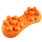 Orange acupressure massager with clustered round nubs and a textured center