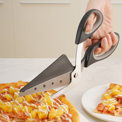 Pizza cutting scissors with stainless blades and black handles, held over sliced pizza