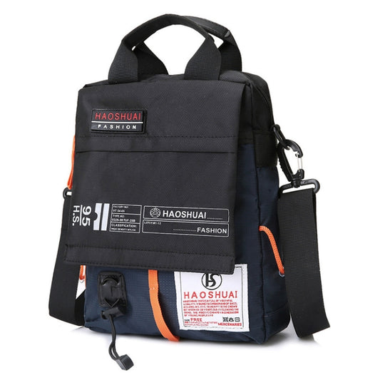 Men’s handheld crossbody bag in dark navy/black with orange trim and carry handles