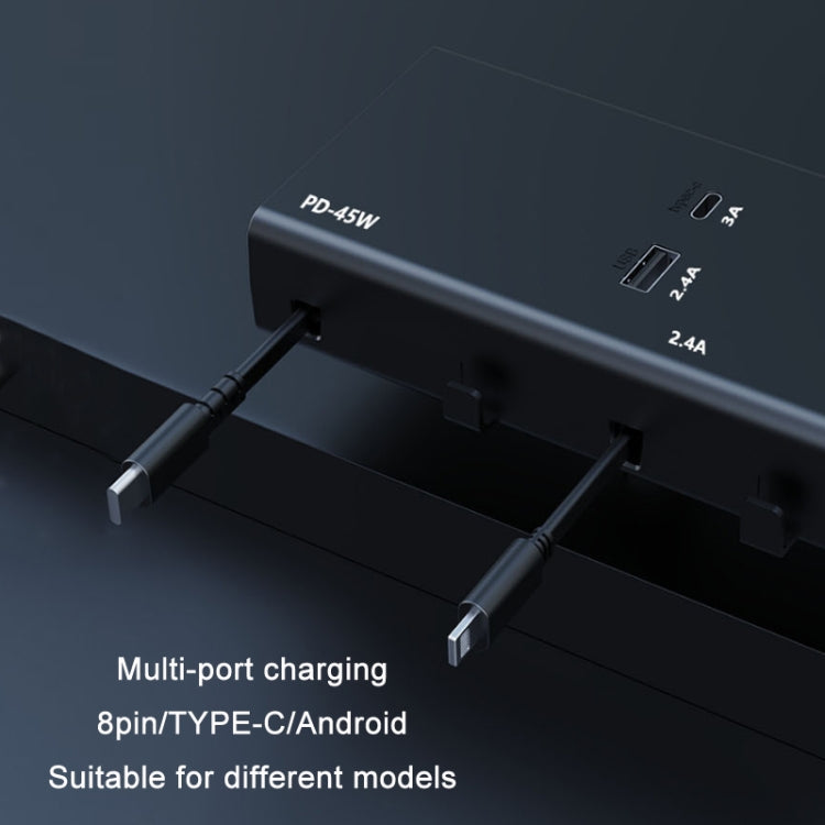 Black car USB charger face with USB-A and USB-C ports and retractable cables