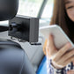 Car charger dock attached to the seat headrest with retractable cables