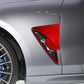 Red carbon-fiber front fender trim sticker on car wheel-arch corner