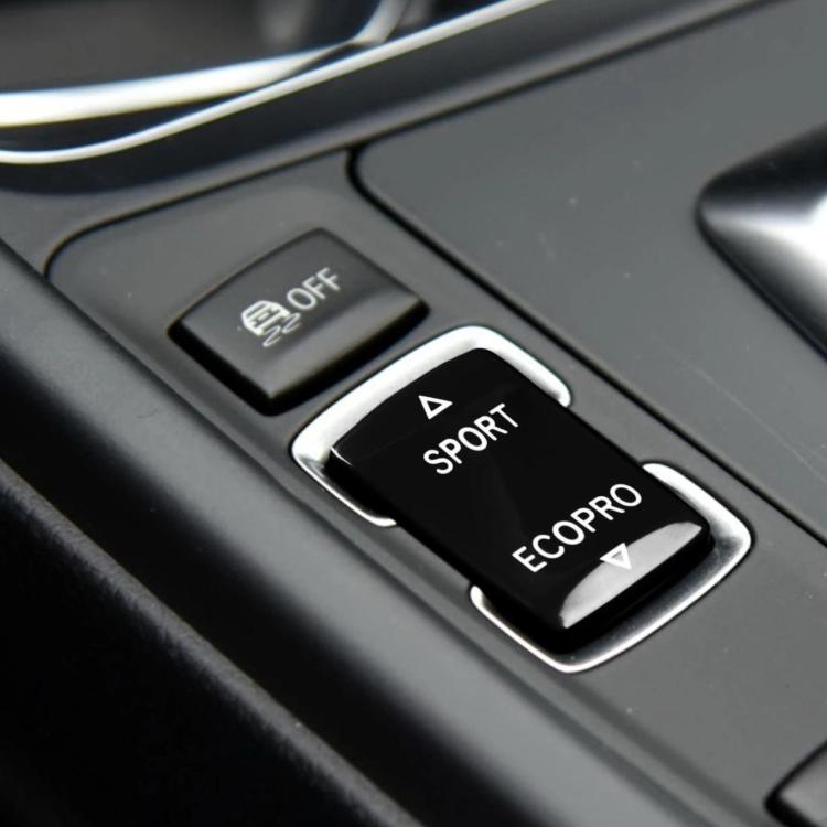 Black gear mode switch button with SPORT and ECOPRO markings