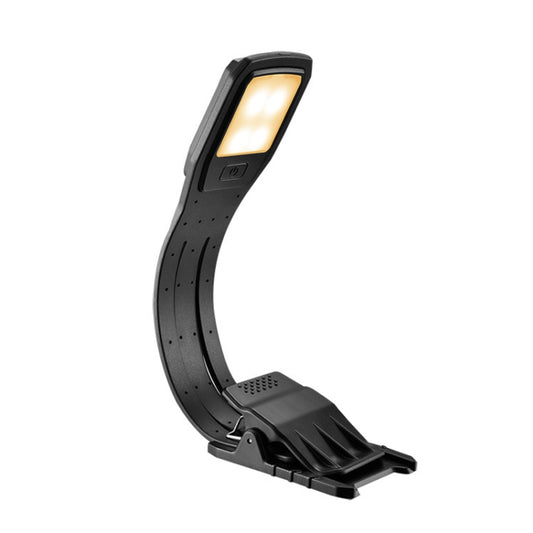 Portable book clip light with curved black clip and warm LED panel