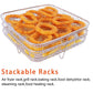 Stackable air fryer wire rack holding golden dehydrated ring slices on the tray