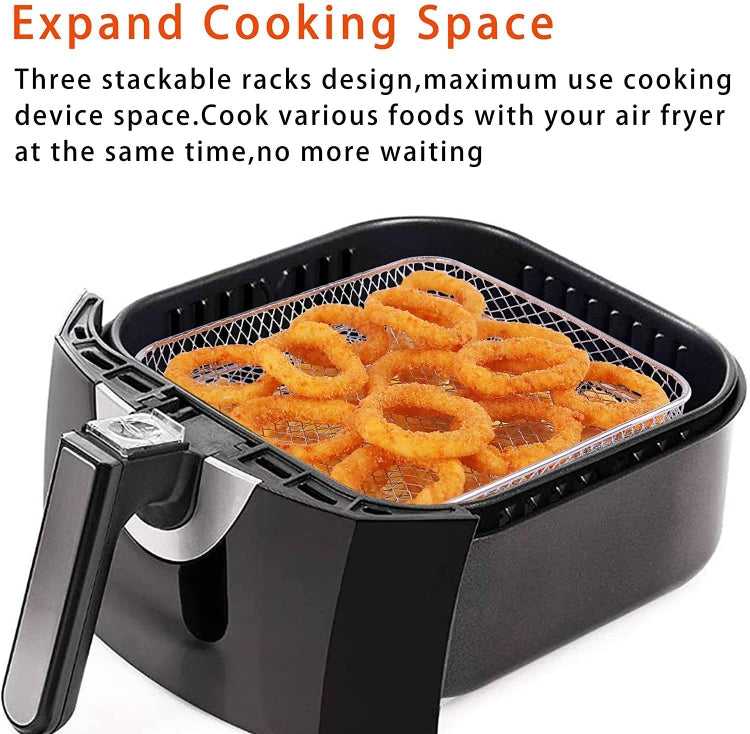 Air fryer wire rack insert with golden food rings inside the mesh tray