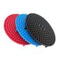 Stack of round gravel filter isolation nets in red, blue, and black with peg holes
