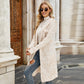 Beige long knit cardigan with zebra-like texture, open front, long sleeves