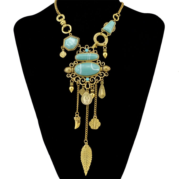 Gold-tone openwork necklace with turquoise stone accents and dangling leaf charms