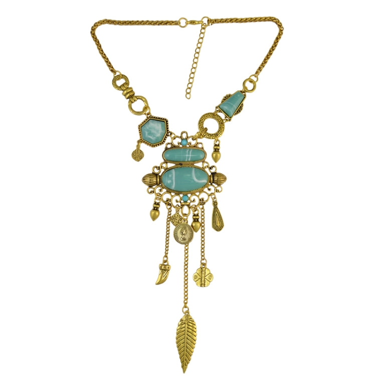 Gold-tone turquoise-stone statement necklace with oval center pendant and tassel drops