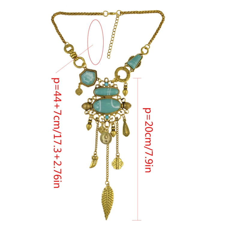 Gold-tone turquoise stone statement necklace with openwork bib and hanging charm drops