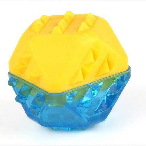 Yellow and blue TPR dog chew ball toy with textured ridges