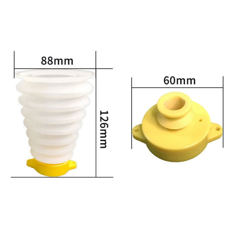 White accordion dust guard with yellow collar; molded top with central drill opening