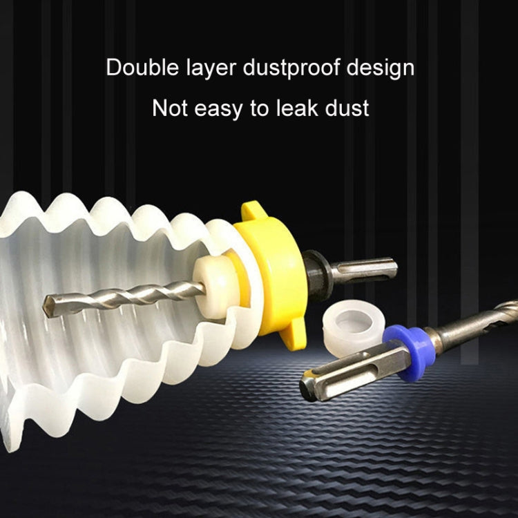 Accordion dust cover fitted to an impact drill, with central metal bit opening