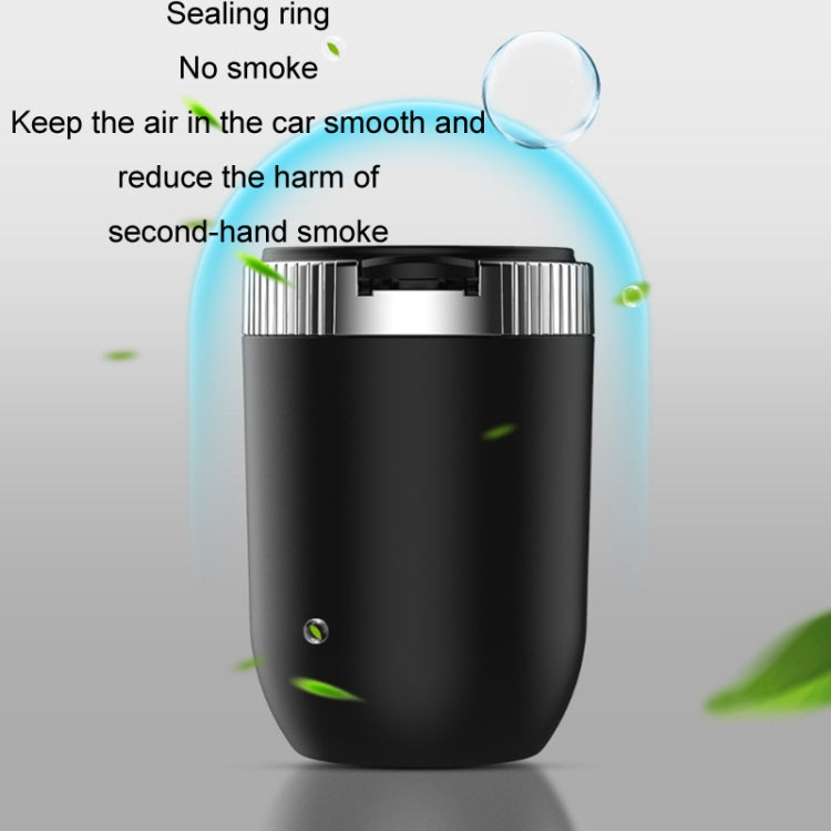 Black car ashtray with sealed cover and base, with small air vent area visible