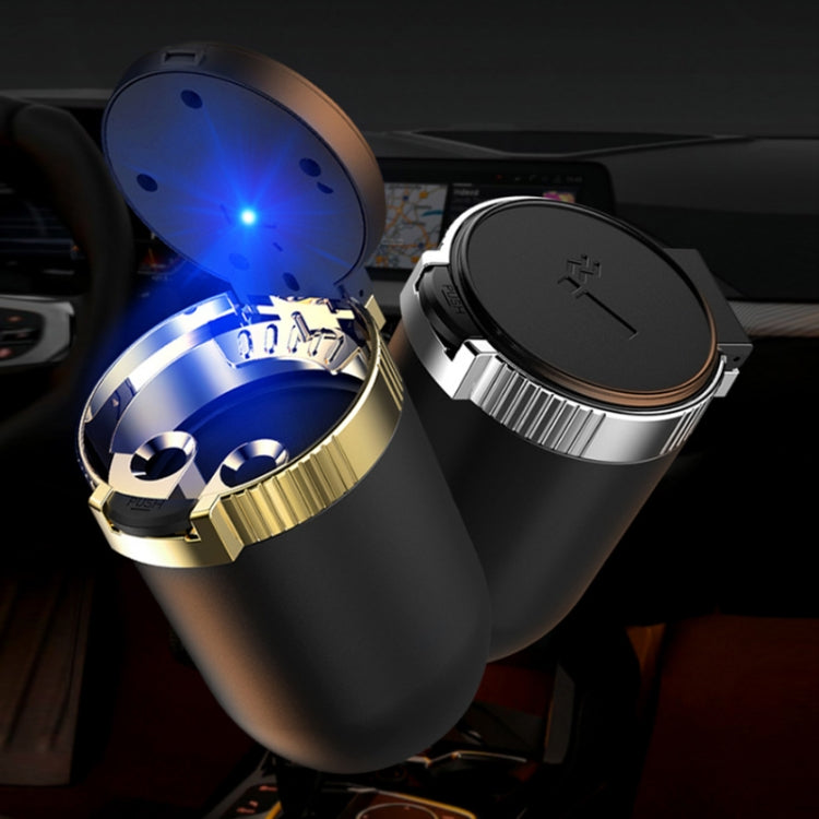 Car ashtray with open cover and blue LED light, black body with silver and gold rim