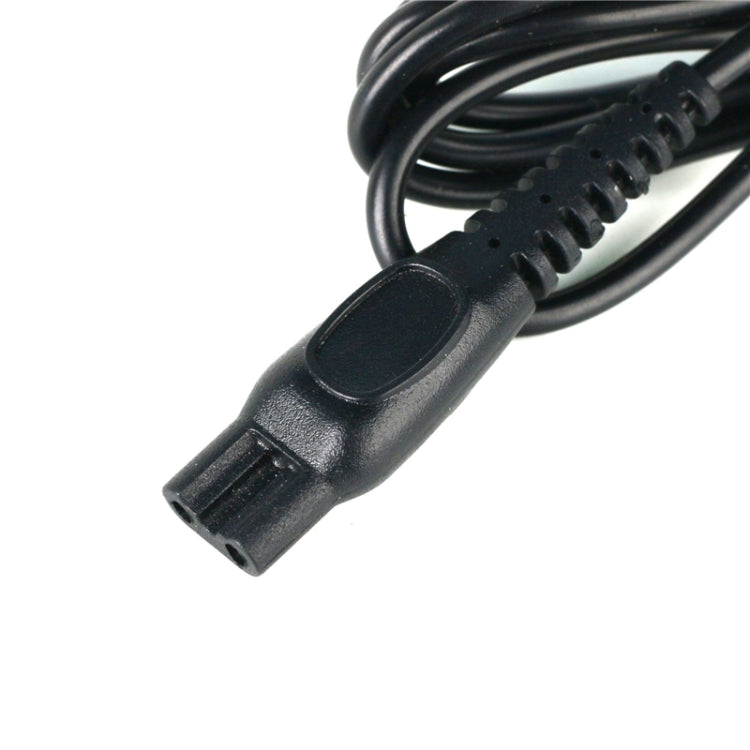 Black shaver charger plug with attached cable end connector