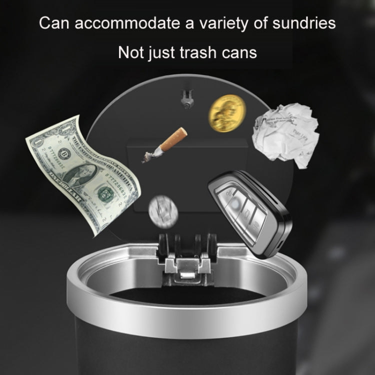 Car cup holder trash can with aroma diffuser and push-open top, shown with assorted waste