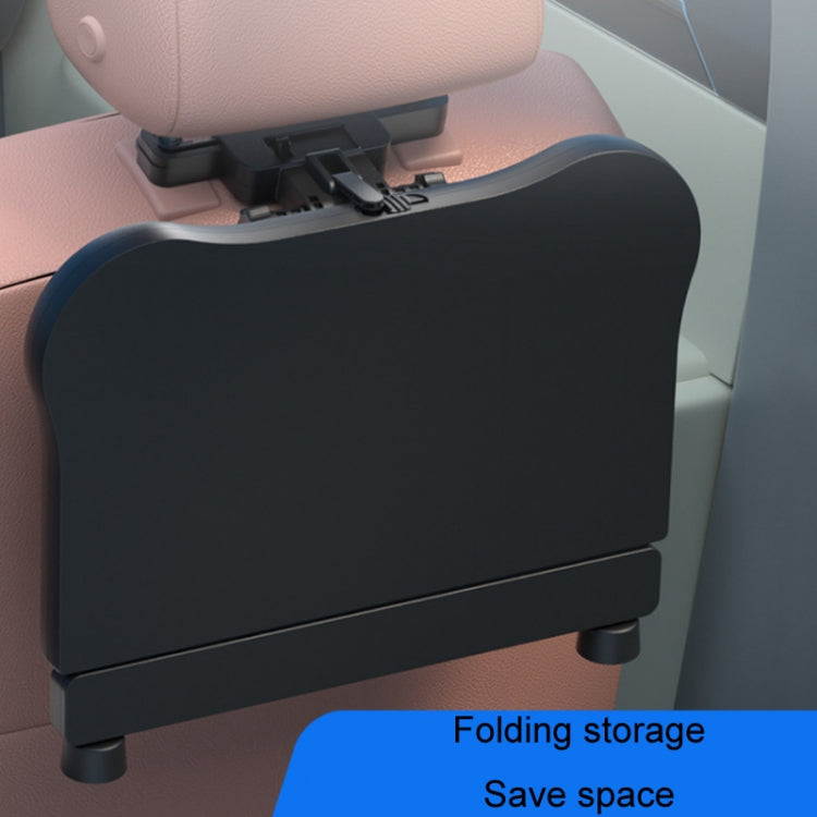 Car seat back tray in use with textured surface and side cup holder