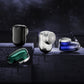 Electric mini shaver with round mesh head, plus travel caps in frame