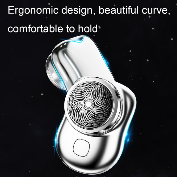 Electric mini shaver with round mesh head and glowing indicator, silver