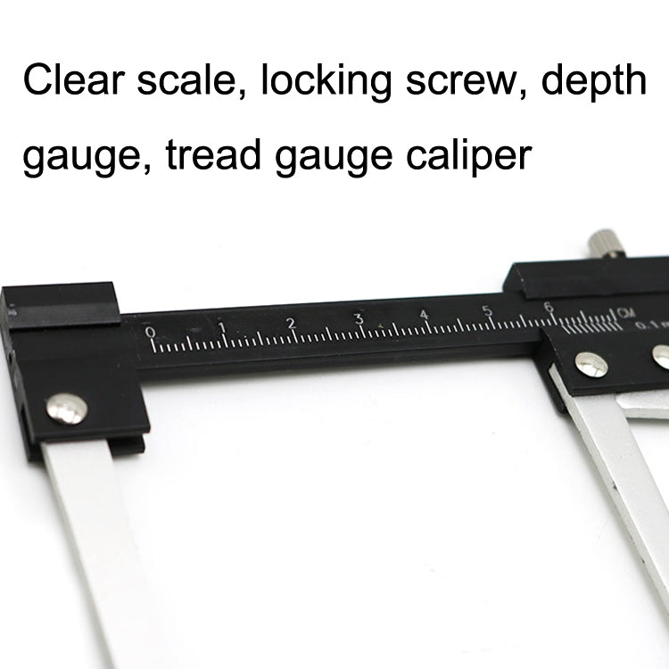 Close-up tire tread depth gauge caliper with metric markings and locking screw
