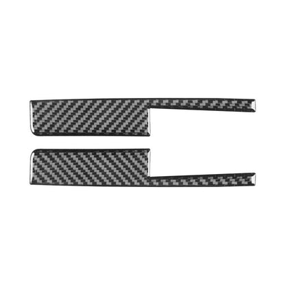 Set of 2 carbon-fiber-look car door lock switch trim pieces, black and gray.