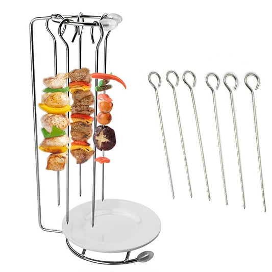 Stainless steel kebab rack with hanging skewers and white drip plate base