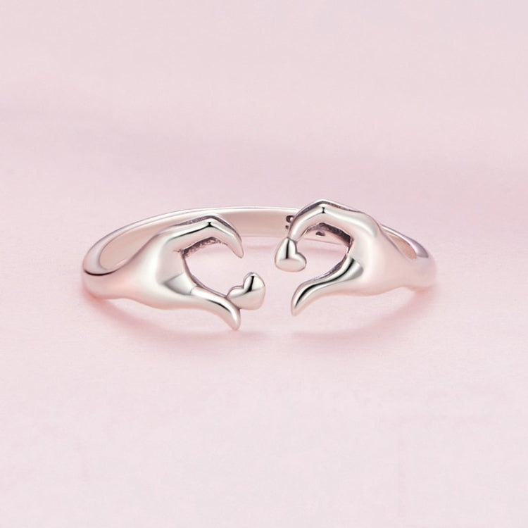 Sterling silver S925 heart gesture open ring top view with heart-shaped cutouts