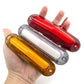 Pair of LED side marker lights held in hand: amber and red lenses with clear strips