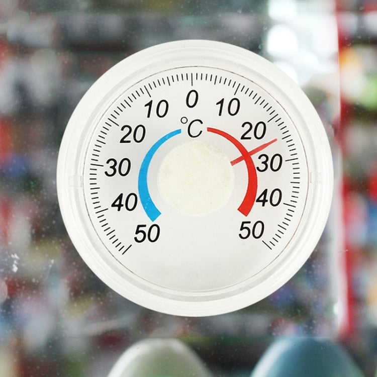 Round plastic thermometer with °C scale and blue/red temperature indicator arcs