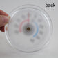 Round plastic thermometer back with central mounting hole