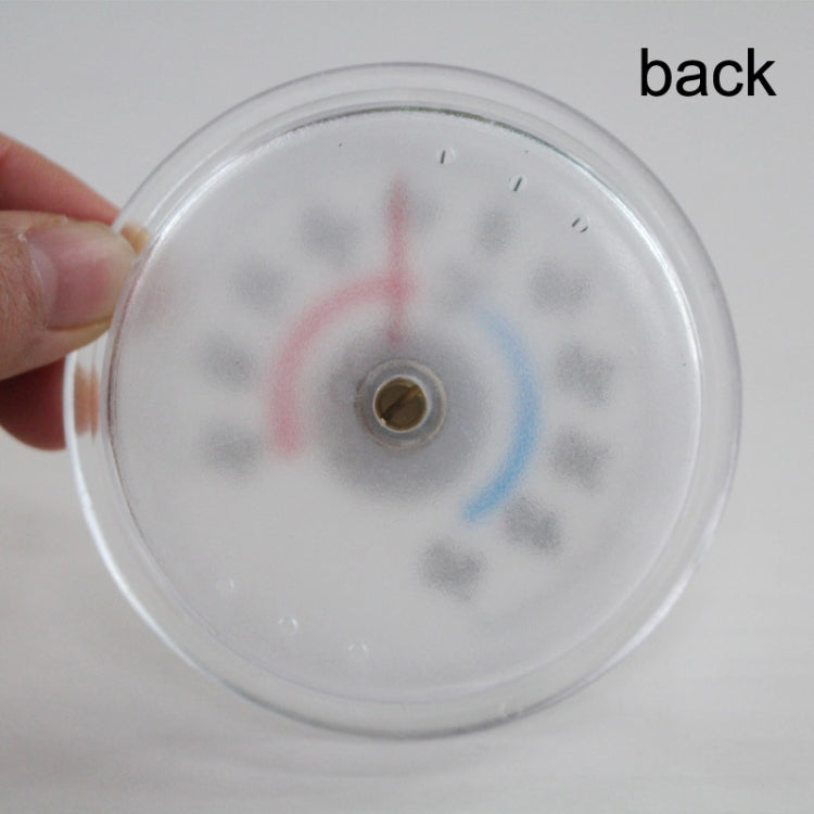 Round plastic thermometer back with central mounting hole