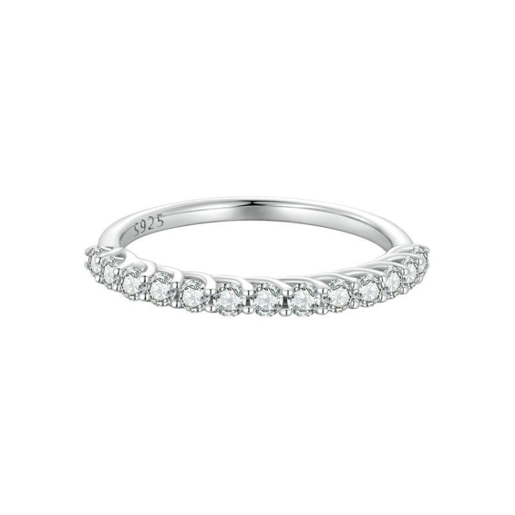 Silver ring band with row of small round stones set across the top edge