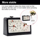 Black double-clock chess timer with quartz dials and red hands
