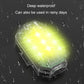 Waterproof LED strobe tail light with transparent housing glowing yellow-green