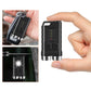 Black mini keychain flashlight held in hand with metal base and carry ring