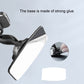 Magnetic car phone holder with adhesive-style base pad and angled mount arm