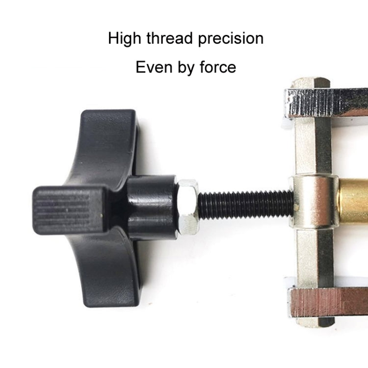 Automotive glass puller tool with long threaded rod, black knob, brass collar, silver clamp