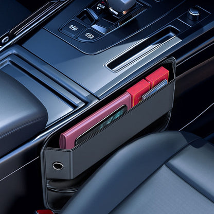 Black car seat gap storage box with open top compartment