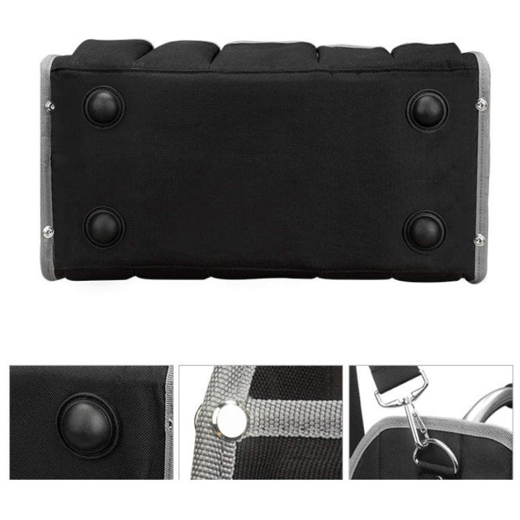 Black tool bag with snap button end panels and metal grommets