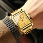 Men's waterproof quartz wristwatch, gold with champagne dial and metal bracelet