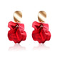 Red fabric petal earrings with layered petals and gold top hook
